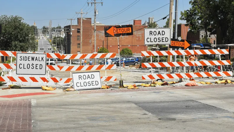 a construction site with signs
